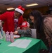 Members of the 117 ARW participate in holiday family event