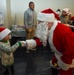 Members of the 117 ARW participate in holiday family event