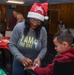 Members of the 117 ARW participate in holiday family event