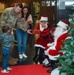 Members of the 117 ARW participate in holiday family event