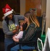 Members of the 117 ARW participate in holiday family event