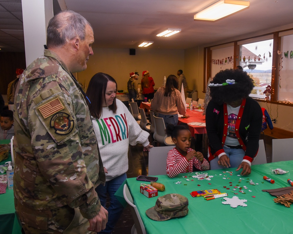 Members of the 117 ARW participate in holiday family event