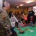 Members of the 117 ARW participate in holiday family event