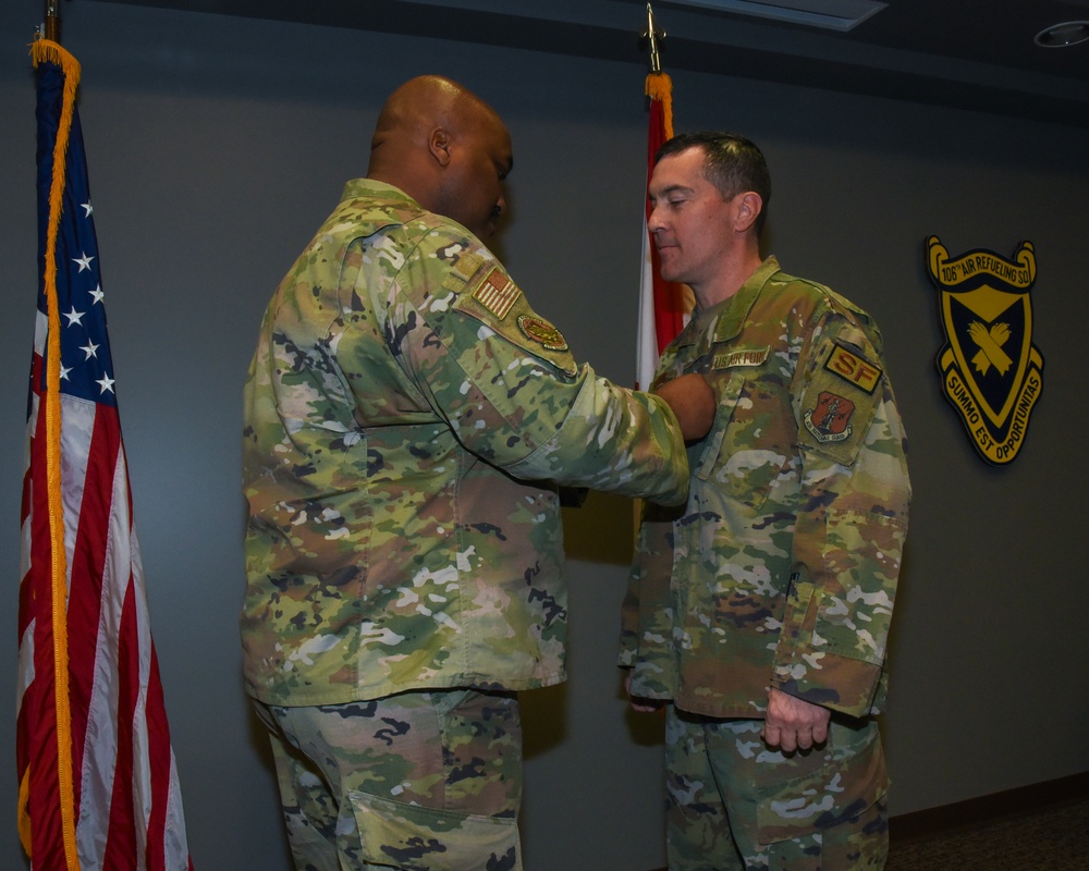 MSGT Spradoni is promoted in a ceremony