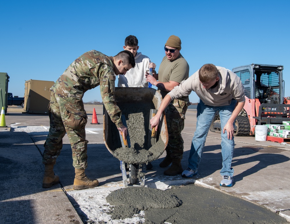 138th Civil Engineer Squadron Airmen fill flightline potholes