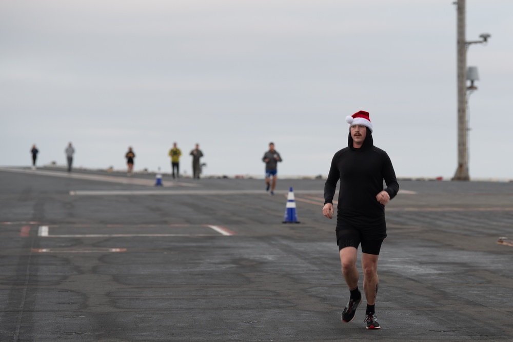 USS Ronald Reagan (CVN 76) hosts a flight deck 5k