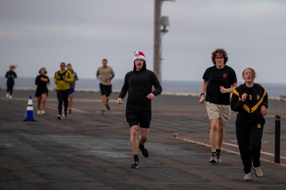 USS Ronald Reagan (CVN 76) hosts a flight deck 5k