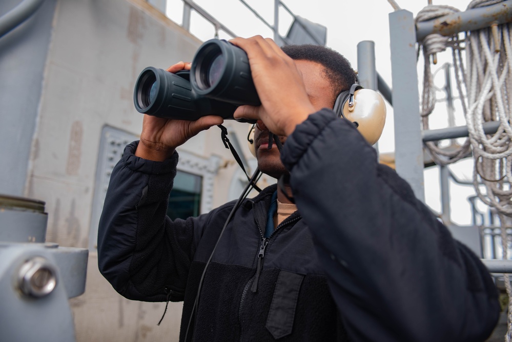 USS Ronald Reagan (CVN 76) Sailors navigate from the pilot house.