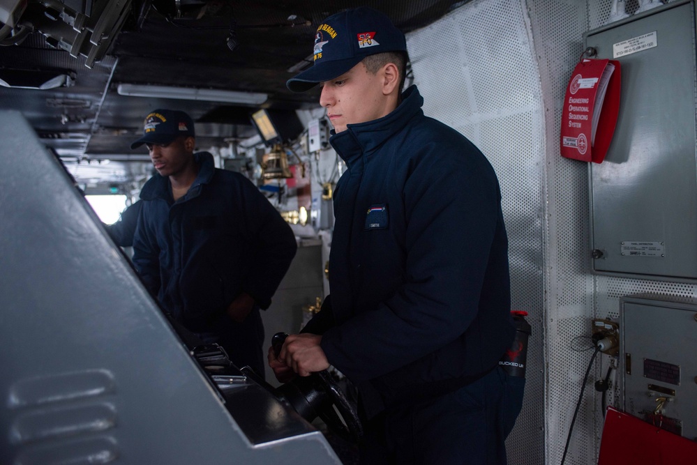 USS Ronald Reagan (CVN 76) Sailors navigate from the pilot house.