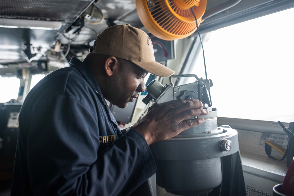 USS Ronald Reagan (CVN 76) Sailors navigate from the pilot house.