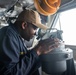 USS Ronald Reagan (CVN 76) Sailors navigate from the pilot house.