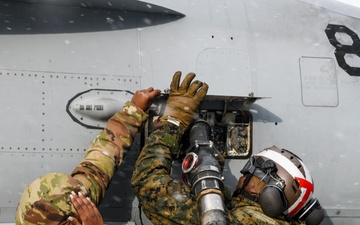 U.S. Marines receive fuel from U.S. Air Force