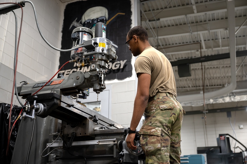 Airman hits the mark drilling precision holes at metals technology