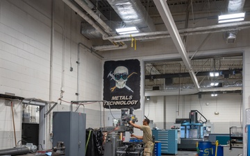 Airman hits the mark drilling precision holes at metals technology