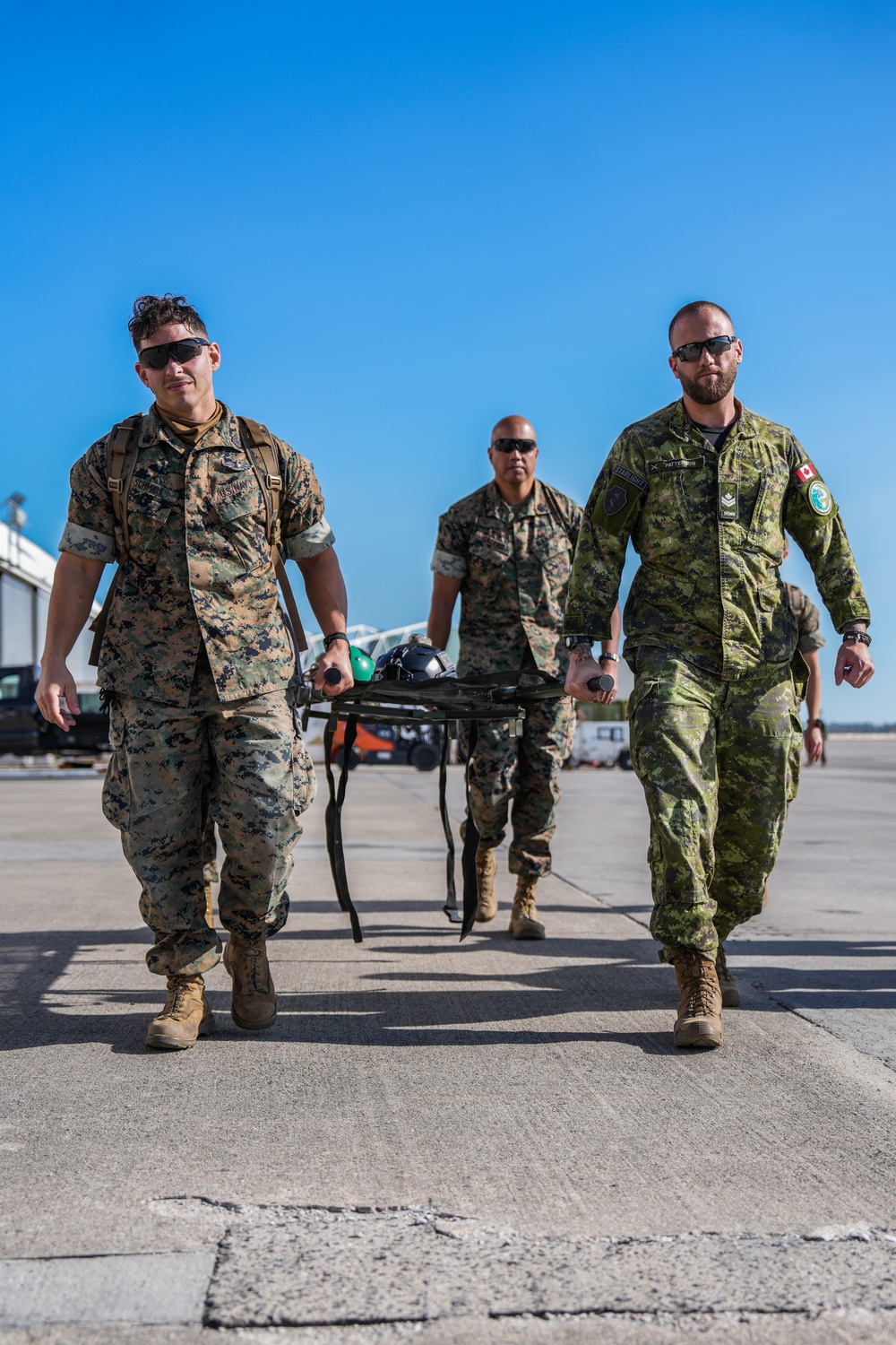 2nd Medical Battalion Examines Huey During Bold Quest