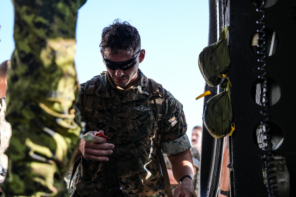 2nd Medical Battalion Examines Huey During Bold Quest