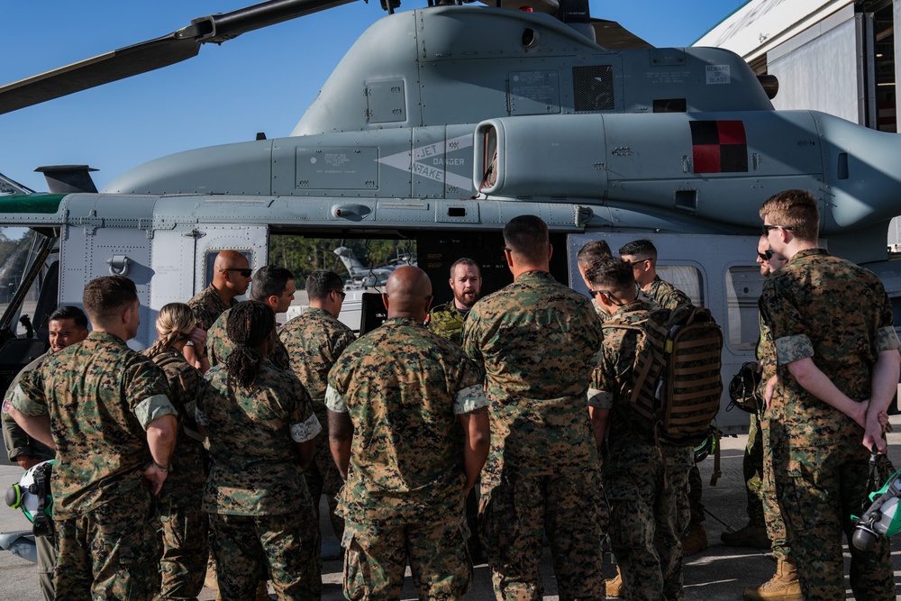 2nd Medical Battalion Examines Huey During Bold Quest