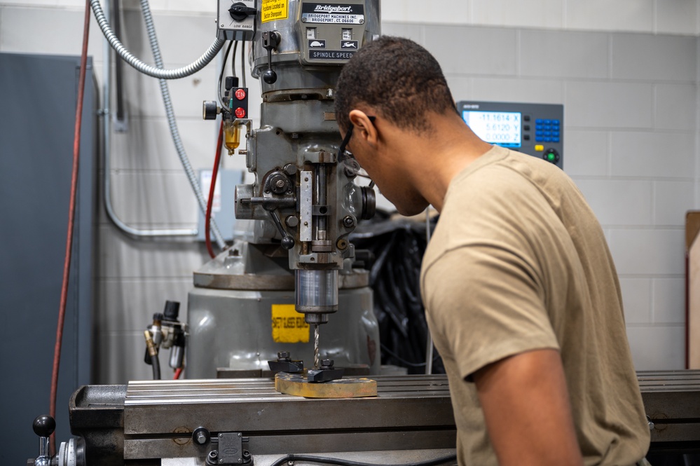 Airman hits the mark drilling precision holes at metals technology