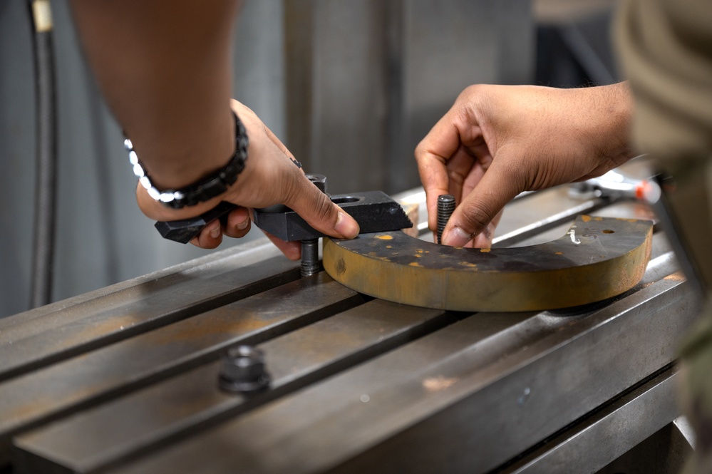 Airman hits the mark drilling precision holes at metals technology