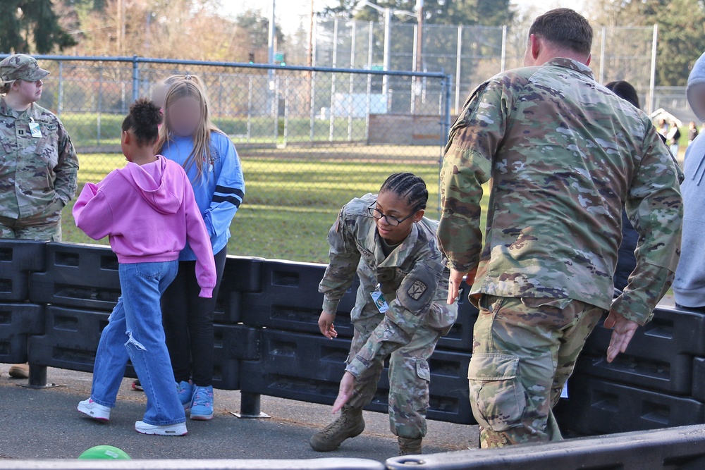 Rest Assured Soldiers visit Thompson Fifth Graders