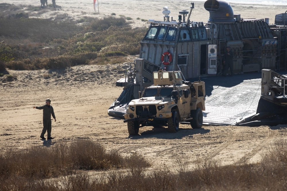 U.S. Sailors offload vehicles from LCACs during Steel Knight 24