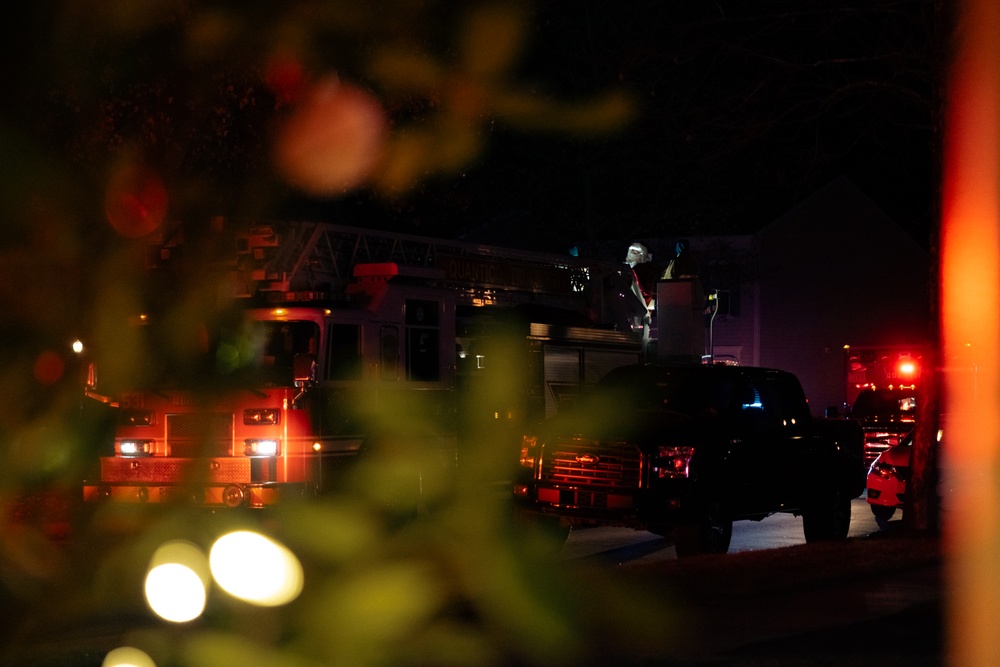 Santa brings cheer to residents of MCB Quantico neighborhoods