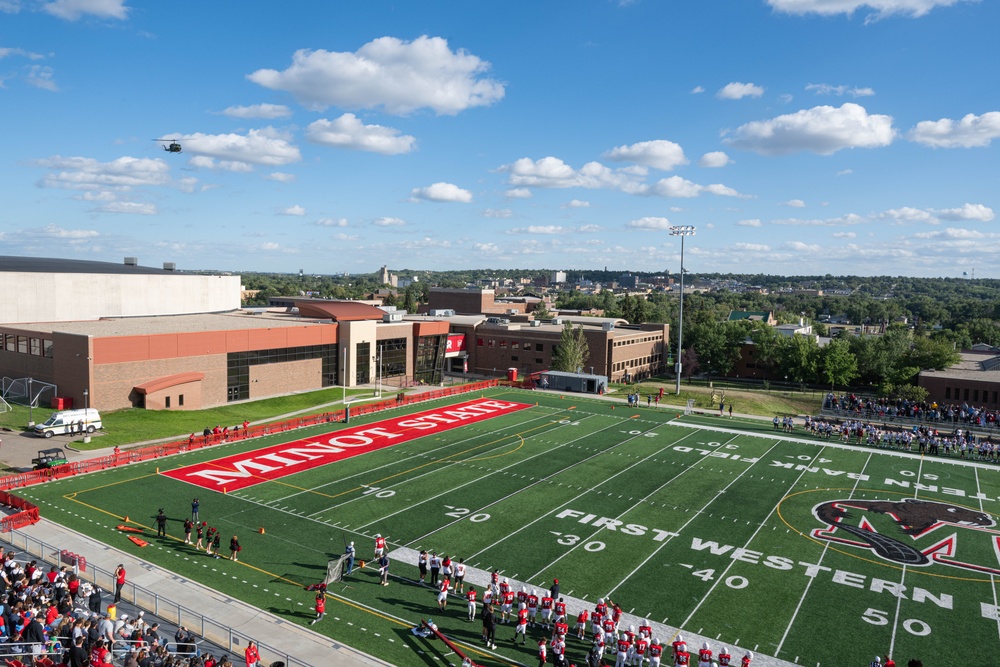 Operation Bosslift: Team Minot kicks off Minot State University football game