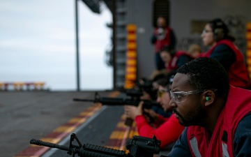 USS Tripoli Sailors Conduct a Weapons Qualification