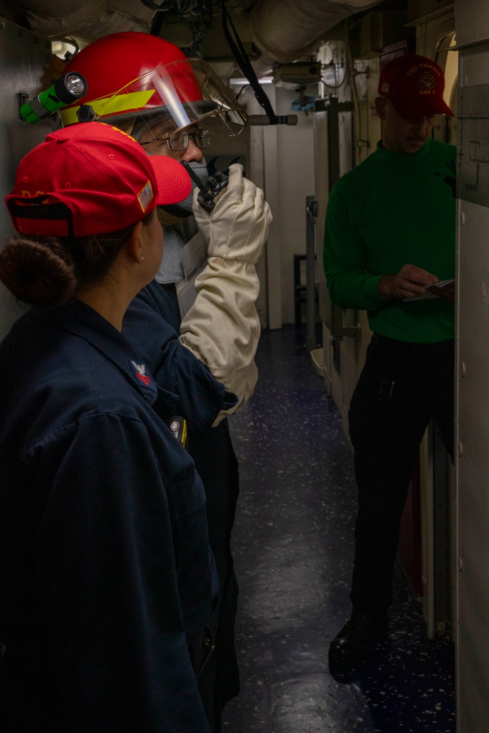 USS Tripoli Sailors Conduct a General Quarters Drill