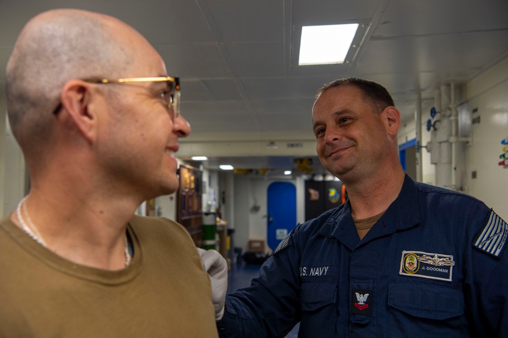 Sailors receive flu shots aboard Boxer