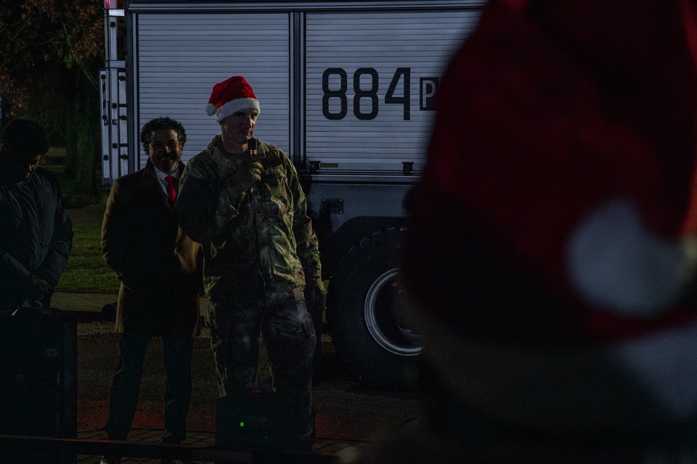 Deployed Soldiers Light Up the Night at Festive Tree Lighting Ceremony