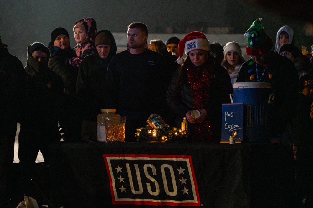 Deployed Soldiers Light Up the Night at Festive Tree Lighting Ceremony
