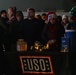 Deployed Soldiers Light Up the Night at Festive Tree Lighting Ceremony