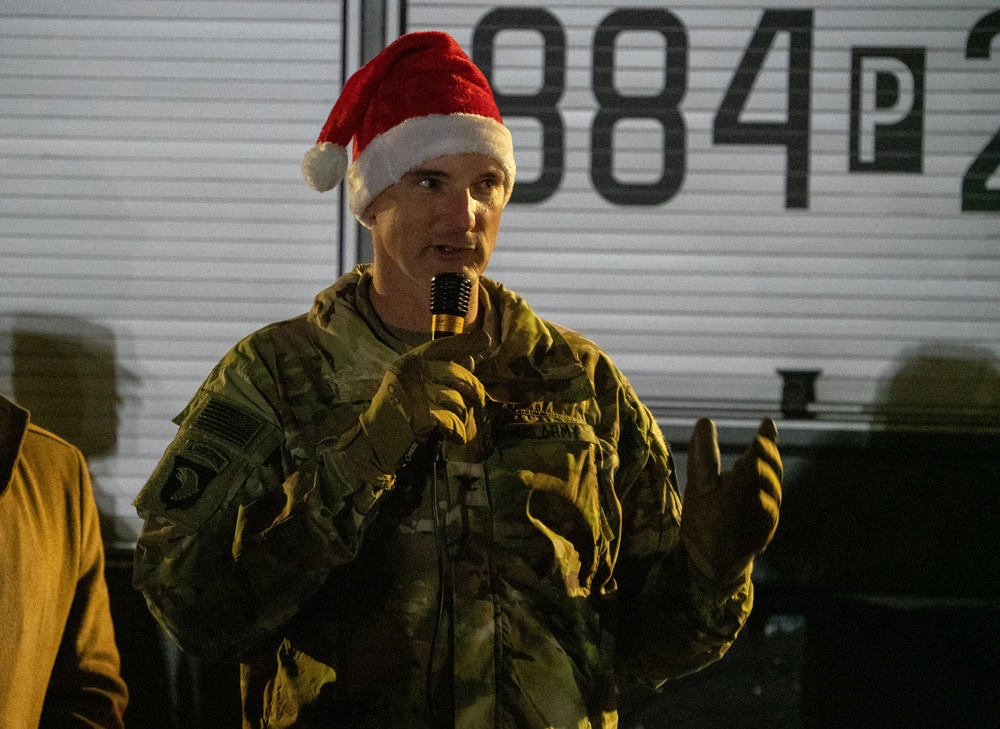 Deployed Soldiers Light Up the Night at Festive Tree Lighting Ceremony