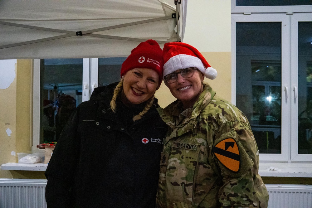 Deployed Soldiers Light Up the Night at Festive Tree Lighting Ceremony