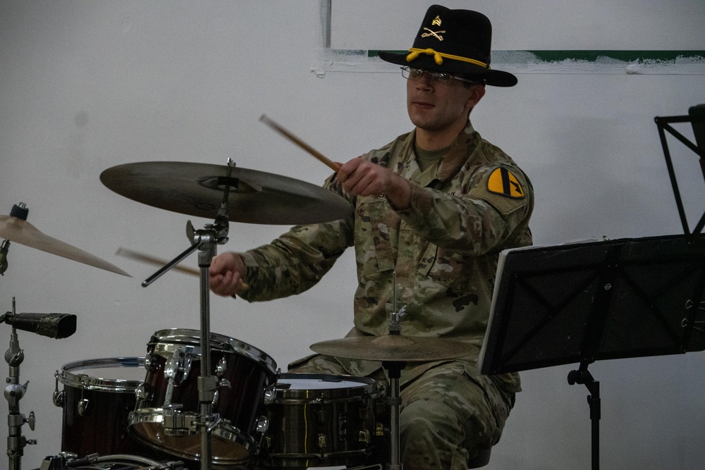 Deployed Soldiers Light Up the Night at Festive Tree Lighting Ceremony