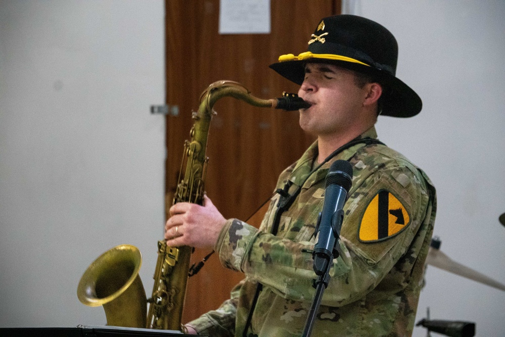 Deployed Soldiers Light Up the Night at Festive Tree Lighting Ceremony