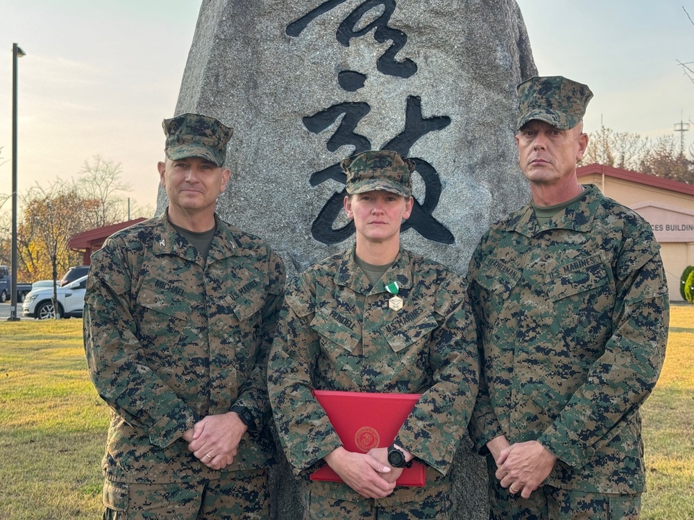 Gunnery Sgt. Rundell Receives the Navy and Marine Corps Commendation Medal.