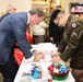 Governor Glenn Youngkin attends Holiday Helper Open House to help bring joy to military families