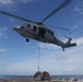 Frank E. Petersen Jr. conducts vertical replenishment-at-sea