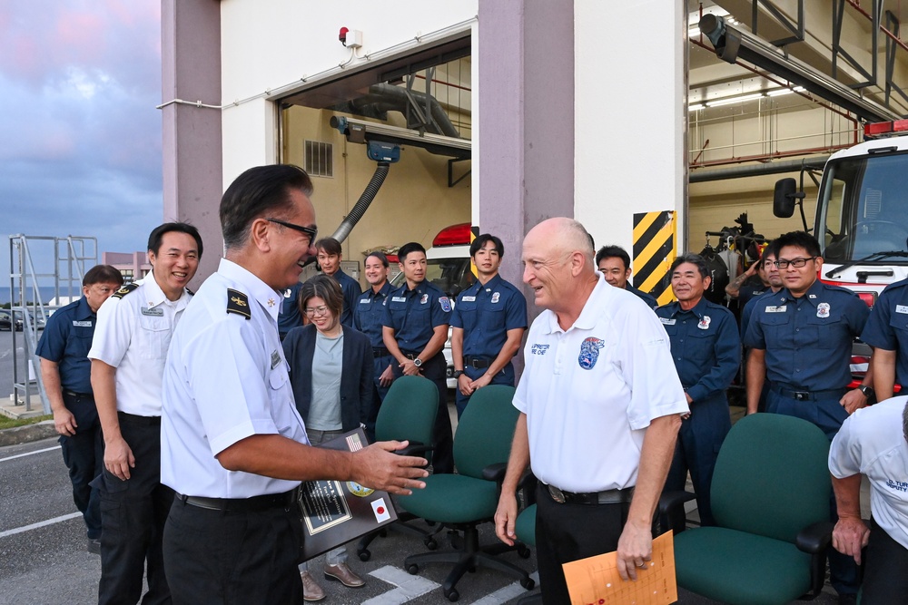 U.S. Army Garrison Okinawa, Matthew Spreitzer, Fire and Emergency Services chief, receives a Farewell