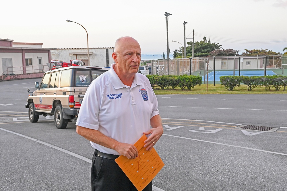 U.S. Army Garrison Okinawa, Matthew Spreitzer, Fire and Emergency Services chief, receives a Farewell