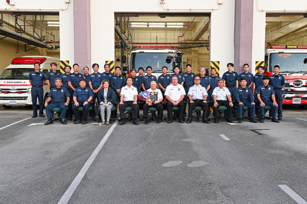 U.S. Army Garrison Okinawa, Matthew Spreitzer, Fire and Emergency Services chief, receives a Farewell