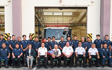 U.S. Army Garrison Okinawa, Matthew Spreitzer, Fire and Emergency Services chief, receives a Farewell