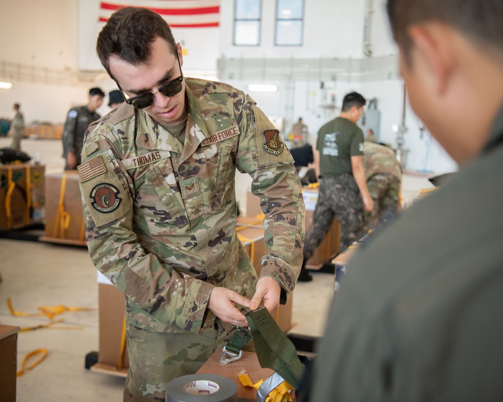 OCD: International Observance Program partners assist with bundle preparation