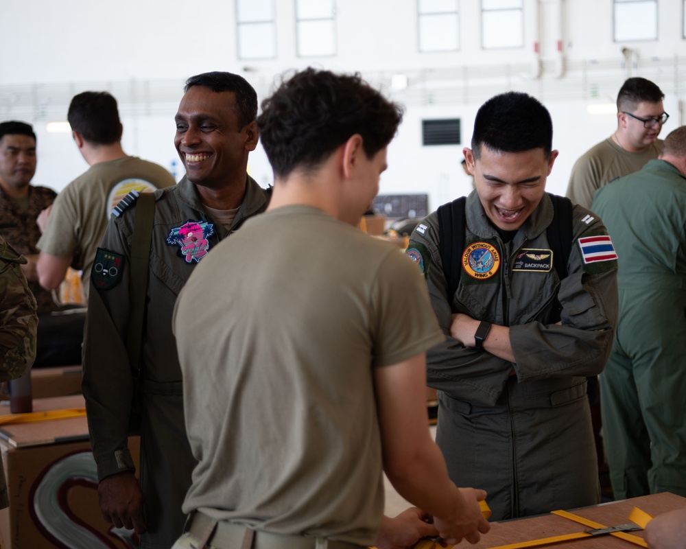 OCD: International Observance Program partners assist with bundle preparation