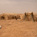 U.S. Airmen build tents during tactical airfield exercise