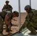 U.S. Airmen build tents during tactical airfield exercise