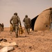 U.S. Airmen build tents during tactical airfield exercise