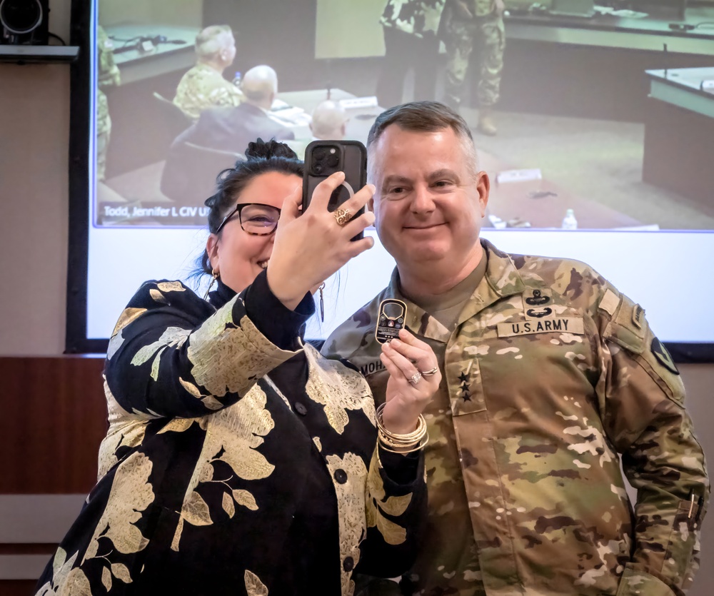 Awardee takes selfie with AMC commander